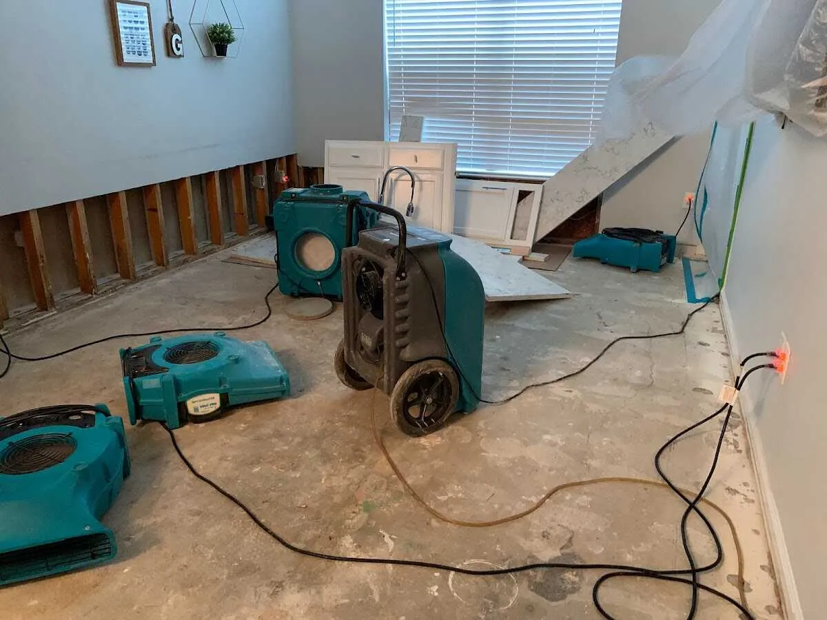 Dehumidifier in flood-cut room for Water Damage Restoration in Sussex